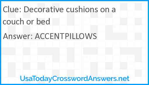 Decorative cushions on a couch or bed Answer