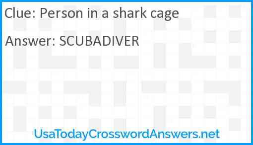 Person in a shark cage Answer